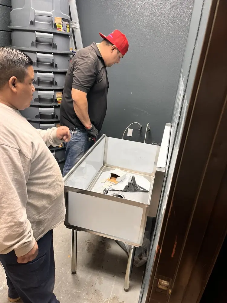 Commercial plumbing and sink installation in Ed Cook